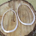 Sterling Silver Hammered Wavy Oval Hoop Earrings (Mexico)