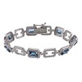 Glitzy Rocks Silver 8.75 CTW London Blue Topaz and Diamond Accent Bracelet