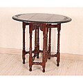 Hand-Carved Mahogany Drop-Leaf Oval Table