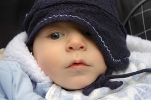 Newborn baby with cute accessories