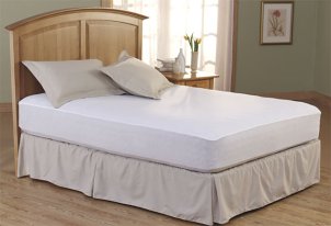 Queen bed with a mattress pad