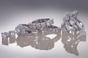 A stack of trendy right-hand diamond rings
