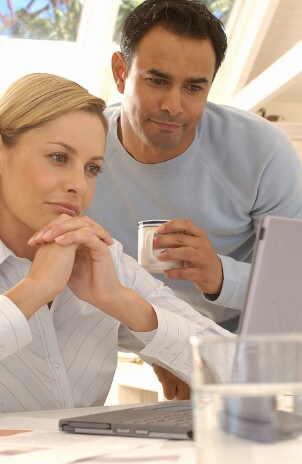 Couple using a laptop