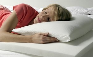 Woman sleeping on memory foam