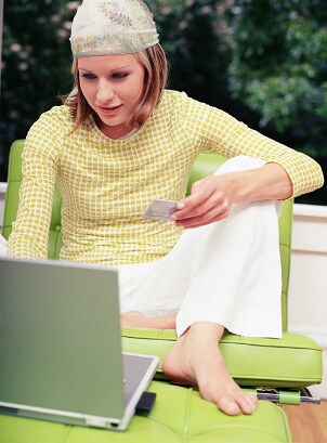 Young woman using an HP laptop computer
