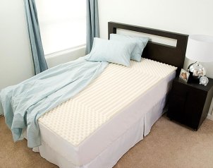 Comfortable bed with a memory foam topper