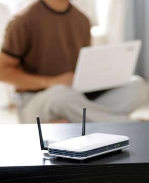 Wireless computer network router on a table