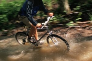 Active mountain biker uses a Casio oudooor and training watch