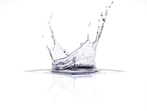 Drop of water splashing from a water filter