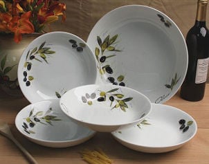 White porcelain bowls are painted with Tuscan olive pattern