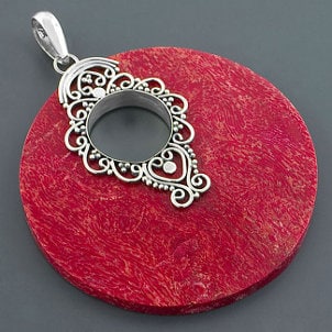 Red coral set in a silver pendant Red coral set in a silver pendant
