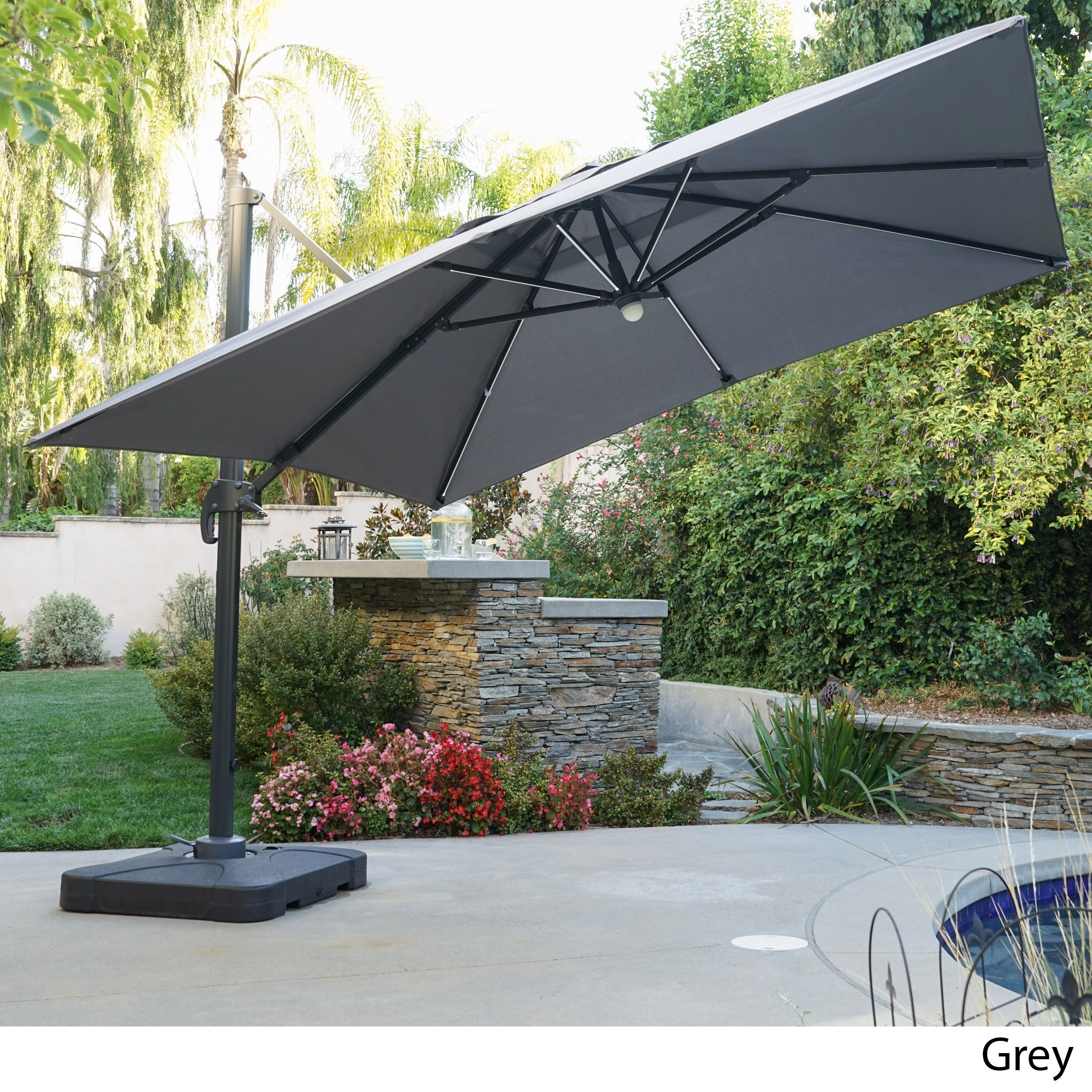 Delray Outdoor 9 7 Ft Canopy Umbrella With Base And Solar Delray Outdoor 9 7 Ft Canopy Umbrella With Base And Solar Light Strip By Christopher Knight Home