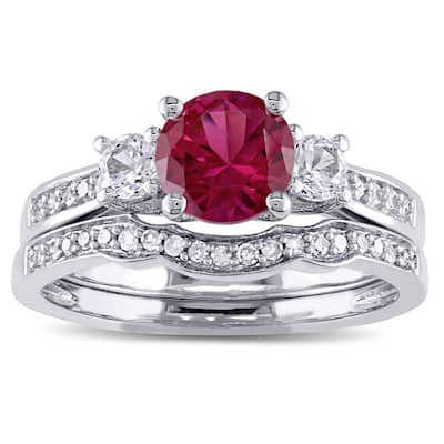 Miadora 10k White Gold Created Ruby and White Sapphire and 1/6ct TDW Diamond 3-stone Bridal Ring Set
