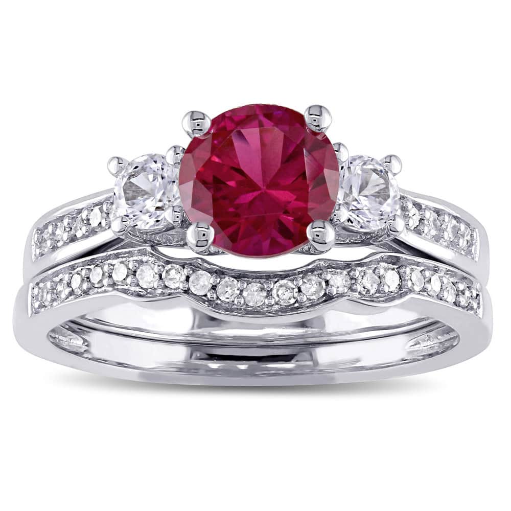 Miadora 10k White Gold Created Ruby and White Sapphire and 1/6ct TDW Diamond 3-stone Bridal Ring Set