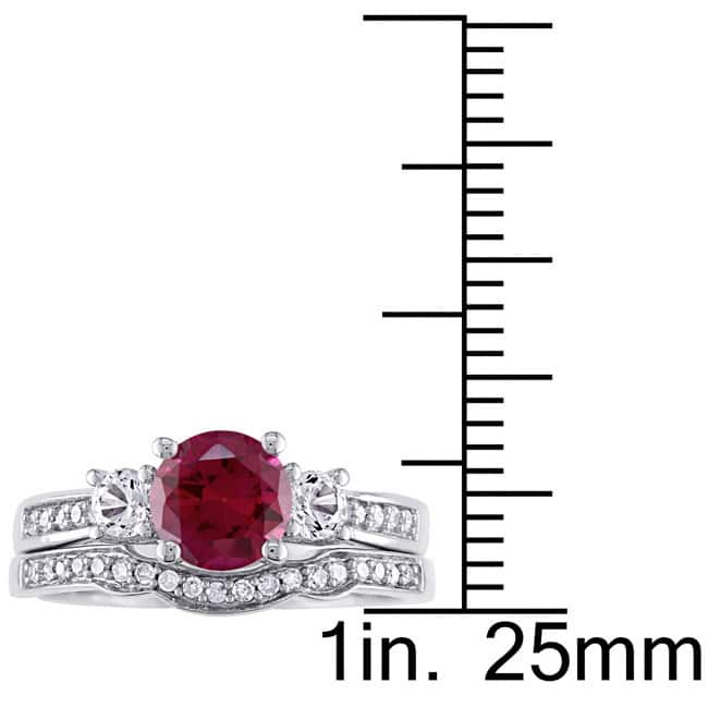 Miadora 10k White Gold Created Ruby and White Sapphire and 1/6ct TDW Diamond 3-stone Bridal Ring Set