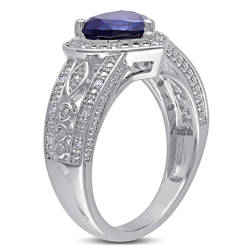 Miadora Sterling Silver Created Blue Sapphire and 1/10ct TDW Diamond Heart Halo Ring