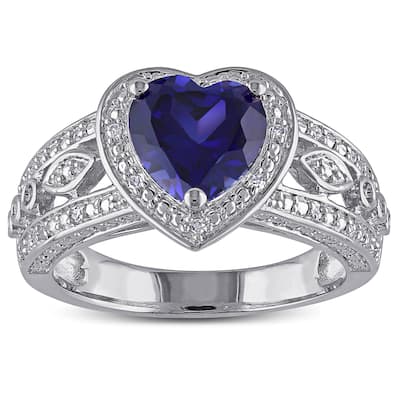 Miadora Sterling Silver Created Blue Sapphire and 1/10ct TDW Diamond Heart Halo Ring