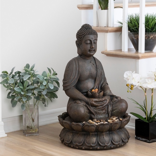 resin meditating buddha on column patio fountain with led light