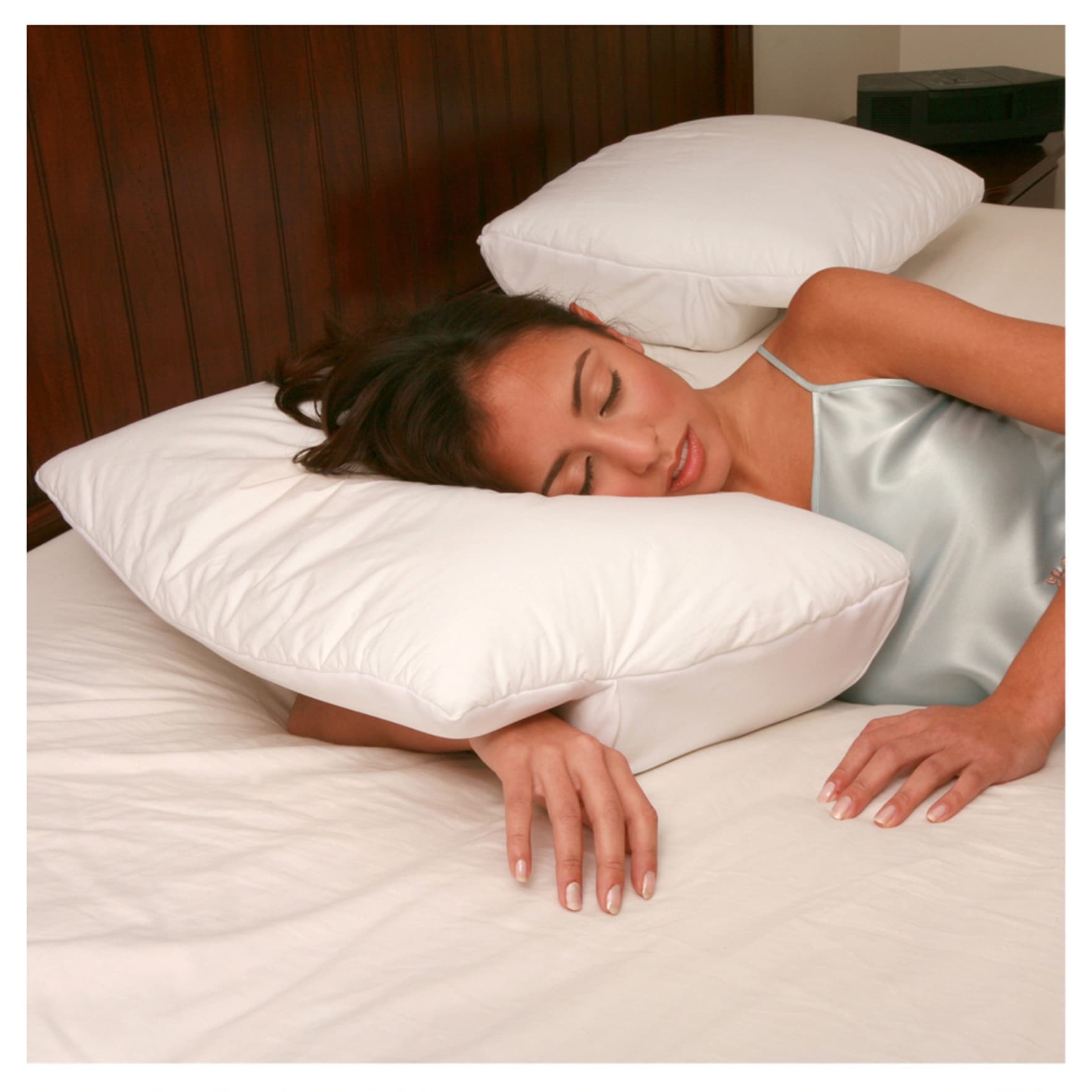 Side sleeper arm under clearance pillow