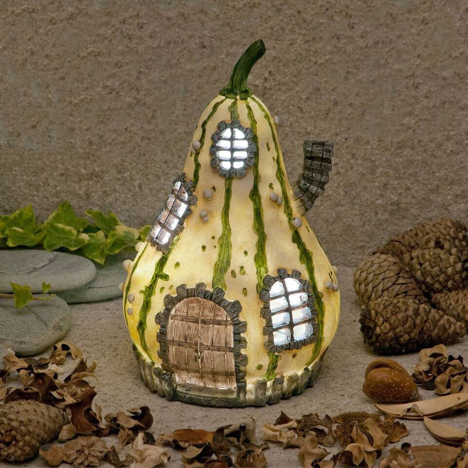 The Home of Petal Flamewand Solar Garden Statue