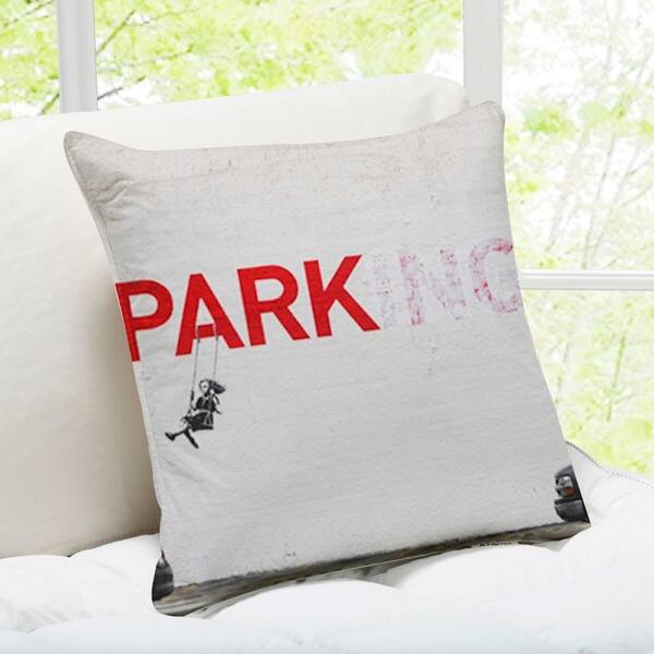 slide 2 of 2, 'Parking Swing Girl' Los Angeles Banksy Throw Pillow