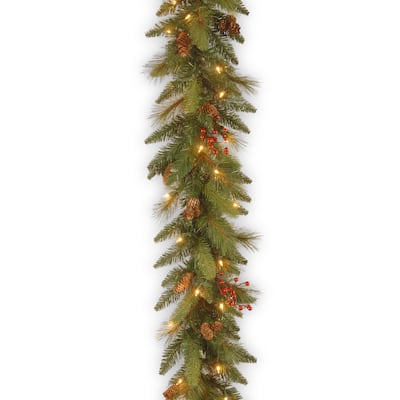 6 ft. Decorative Collection Long Needle Pine Cone Garland with Clear Lights