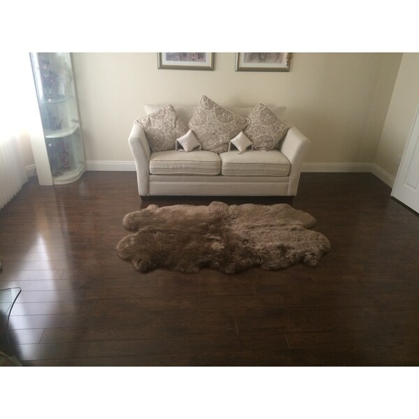 Tribeca Luxurious Faux Sheepskin Oval Shape Black and Off-White Shag Area Rug - 4' x 6' Oval. Opens flyout.