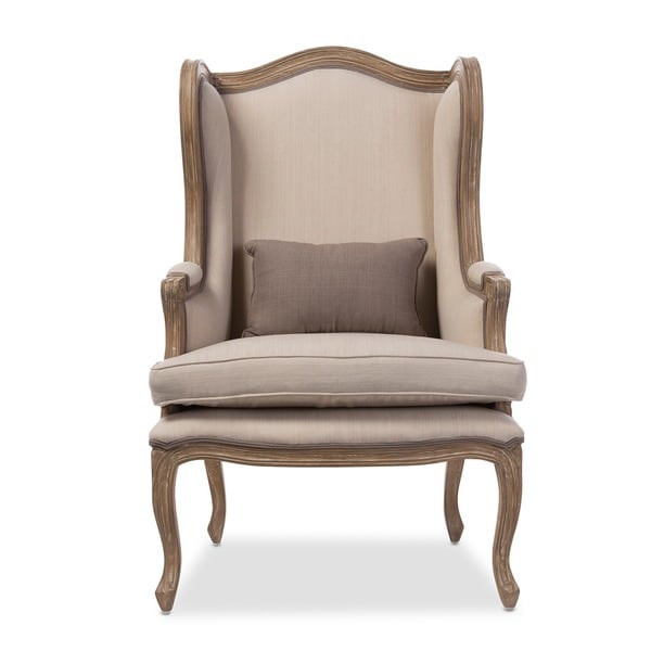 white upholstered armchair