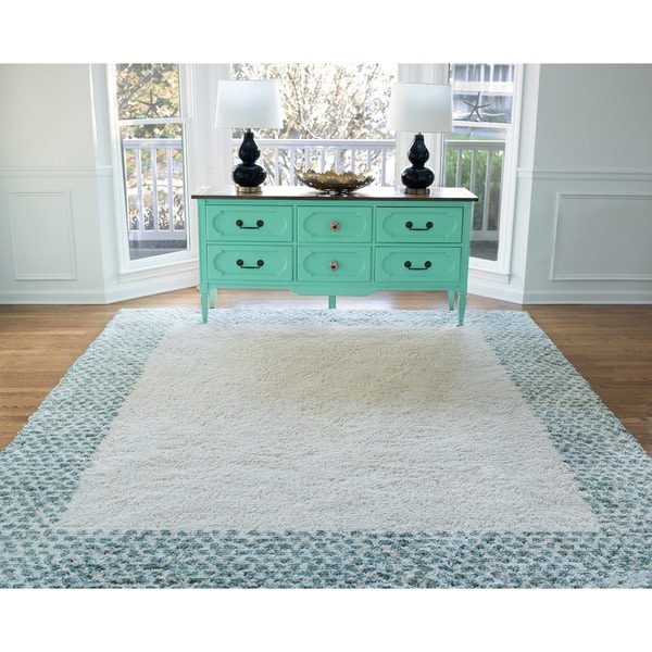 Mohawk Home Spotted Border Woven Area Rug. Opens flyout.
