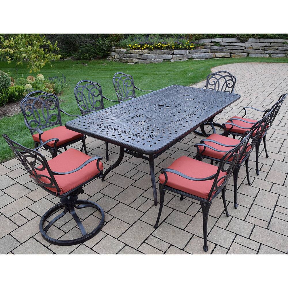 Dining Set has Rectangular Table, 6 Chairs, 2 Swivel Rockers, Cushions