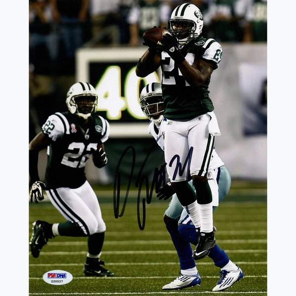 Darrelle Revis Signed Intercepting Football vs. Cowboys 8x10 Photo (Signed in Black) 8x10 Photo ( PSA/DNA Auth)