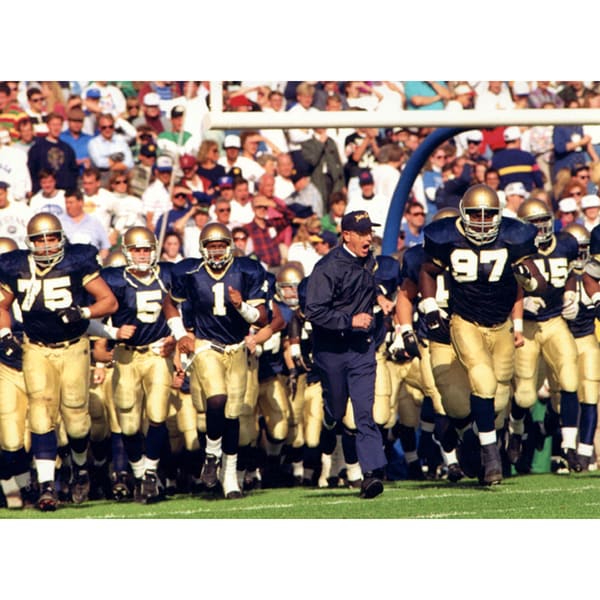 Lou Holtz Running onto the Field with Taylor, Mayes, and Young 8x10 Photo uns.