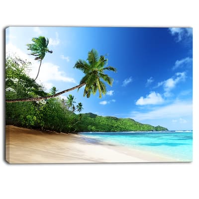 Designart - Sunset Beach with Palm - Landscape Photography Canvas Print