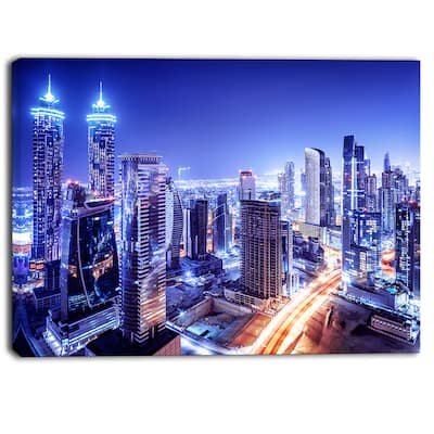 Designart - Dubai Downtown Night Scene - Cityscape Photography Canvas Print - Blue