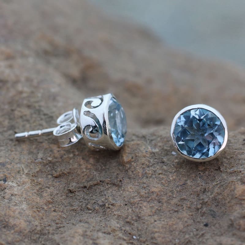 Sterling Silver Spark of Life Blue Topaz Earrings (India)