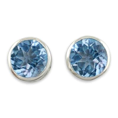 Sterling Silver Spark of Life Blue Topaz Earrings (India)