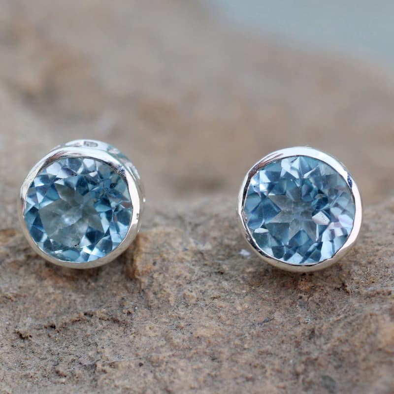 Sterling Silver Spark of Life Blue Topaz Earrings (India)