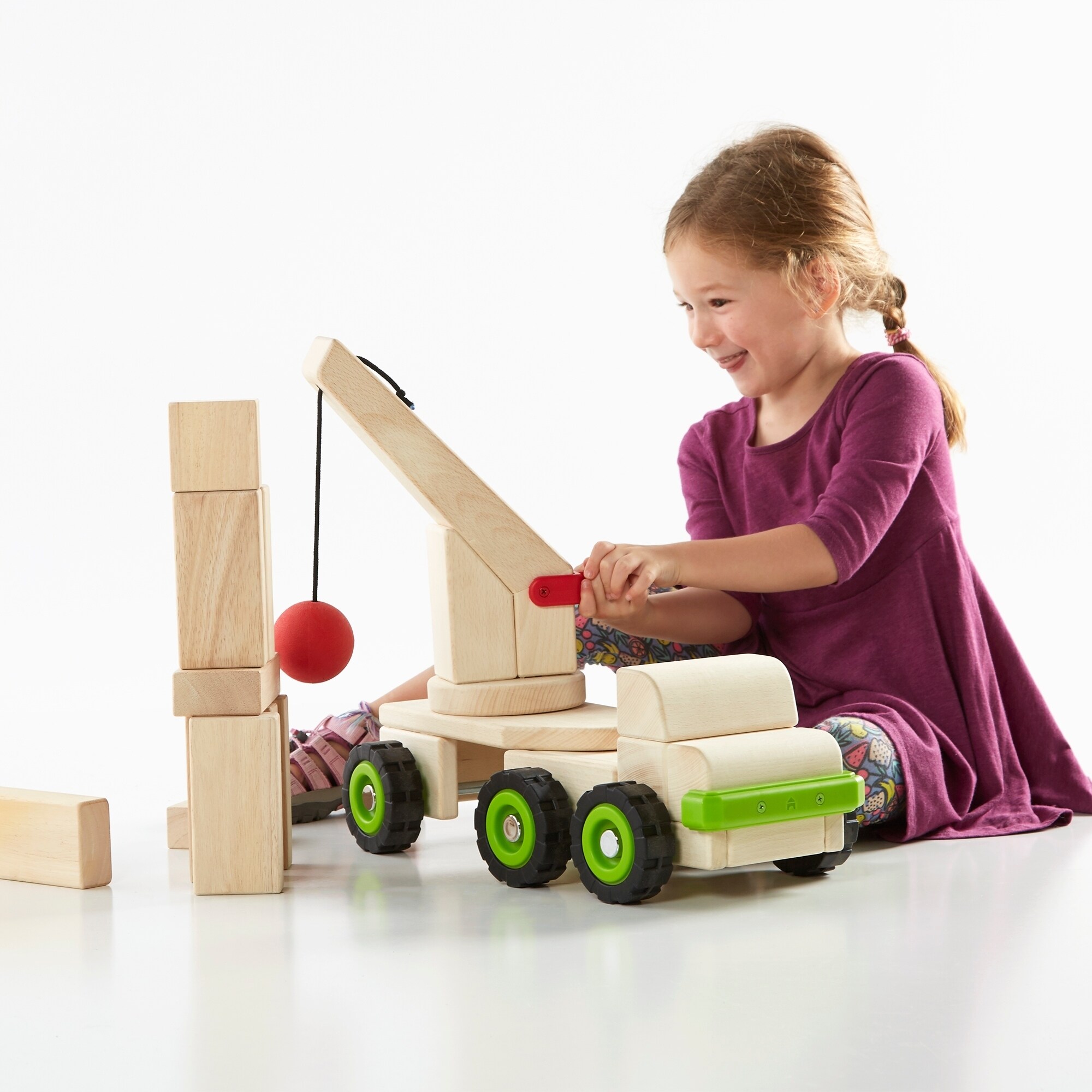 toy crane truck with wrecking ball