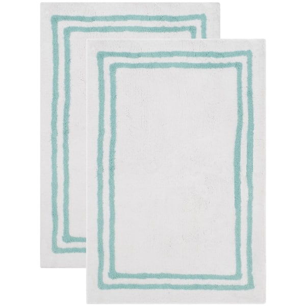 https://ak1.ostkcdn.com/images/products/11704638/Safavieh-Handmade-Plush-Master-Bath-Aqua-Cotton-Rug-2-x-3-ca4891aa-e3f6-48d8-9ec0-7a23020a1302_600.jpg?impolicy=medium