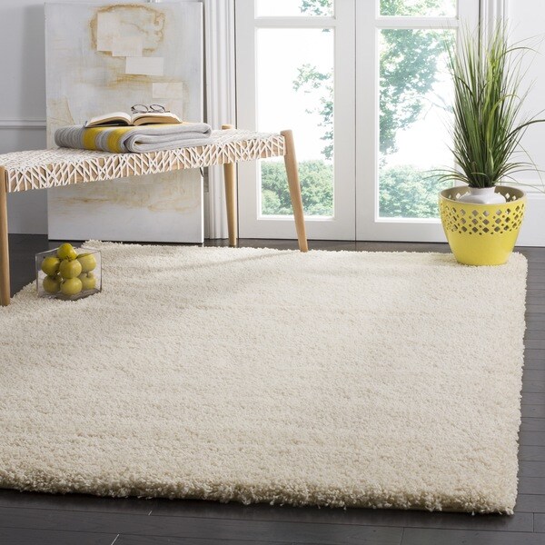 Safavieh Santa Monica Ivory Polyester Rug - 6'7 x 9'6