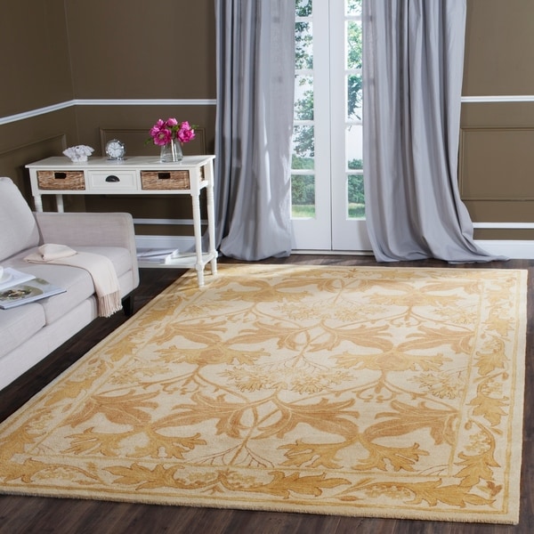 Safavieh Handmade Antiquity Beige/ Gold Wool Rug - 7'6 x 9'6