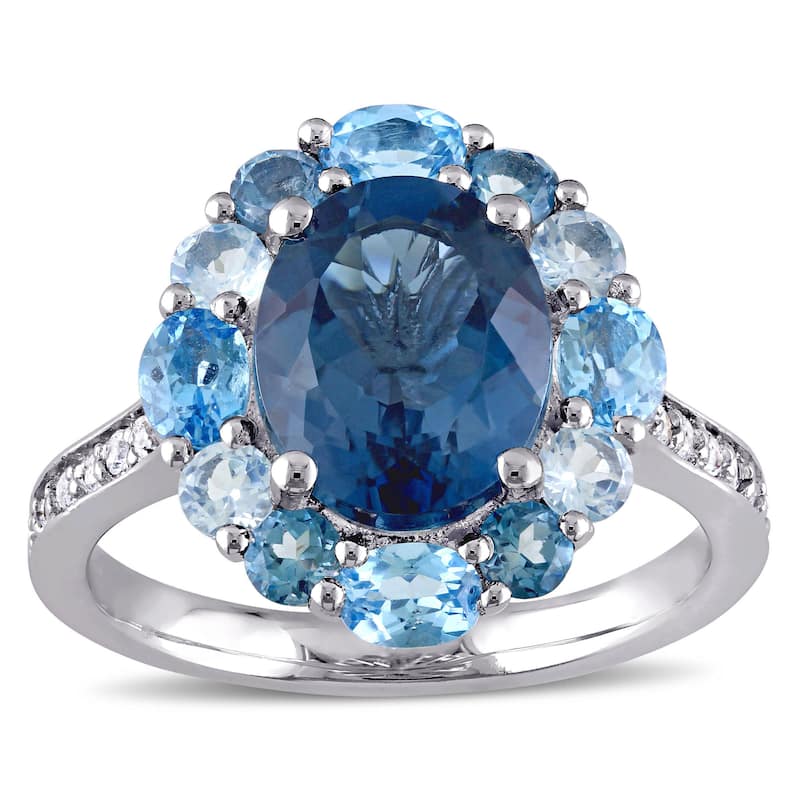 Miadora Sterling Silver Oval-cut Blue and White Topaz Halo Cocktail Ring