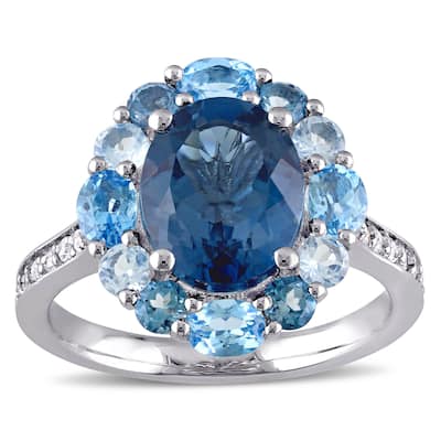 Miadora Sterling Silver Oval-cut Blue and White Topaz Halo Cocktail Ring