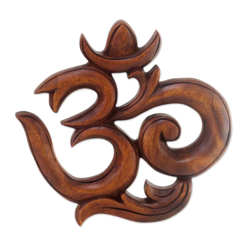 NOVICA Handmade 'Sacred Om Suar' Wood Relief Panel - 20 cm H x 21 cm W x 2.2 cm D - Brown