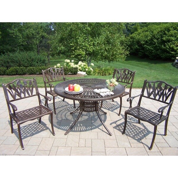 cast aluminium table and 4 chairs