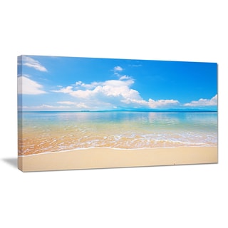Large Clouds Over Calm Beach - Seashore Photo Canvas Print