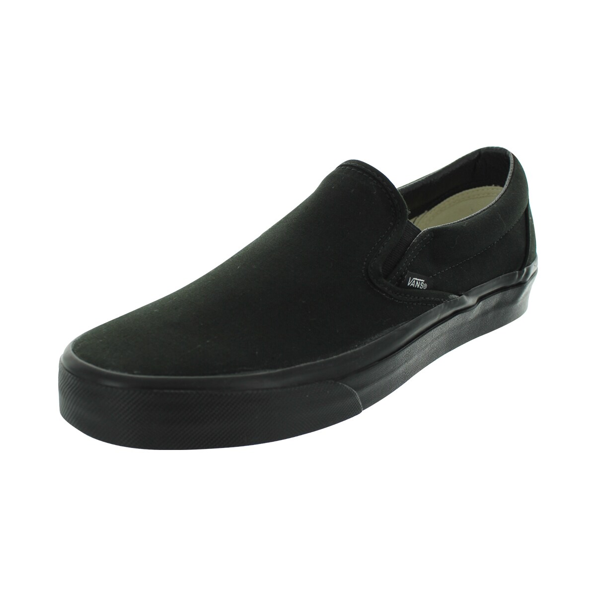 black canvas vans slip on