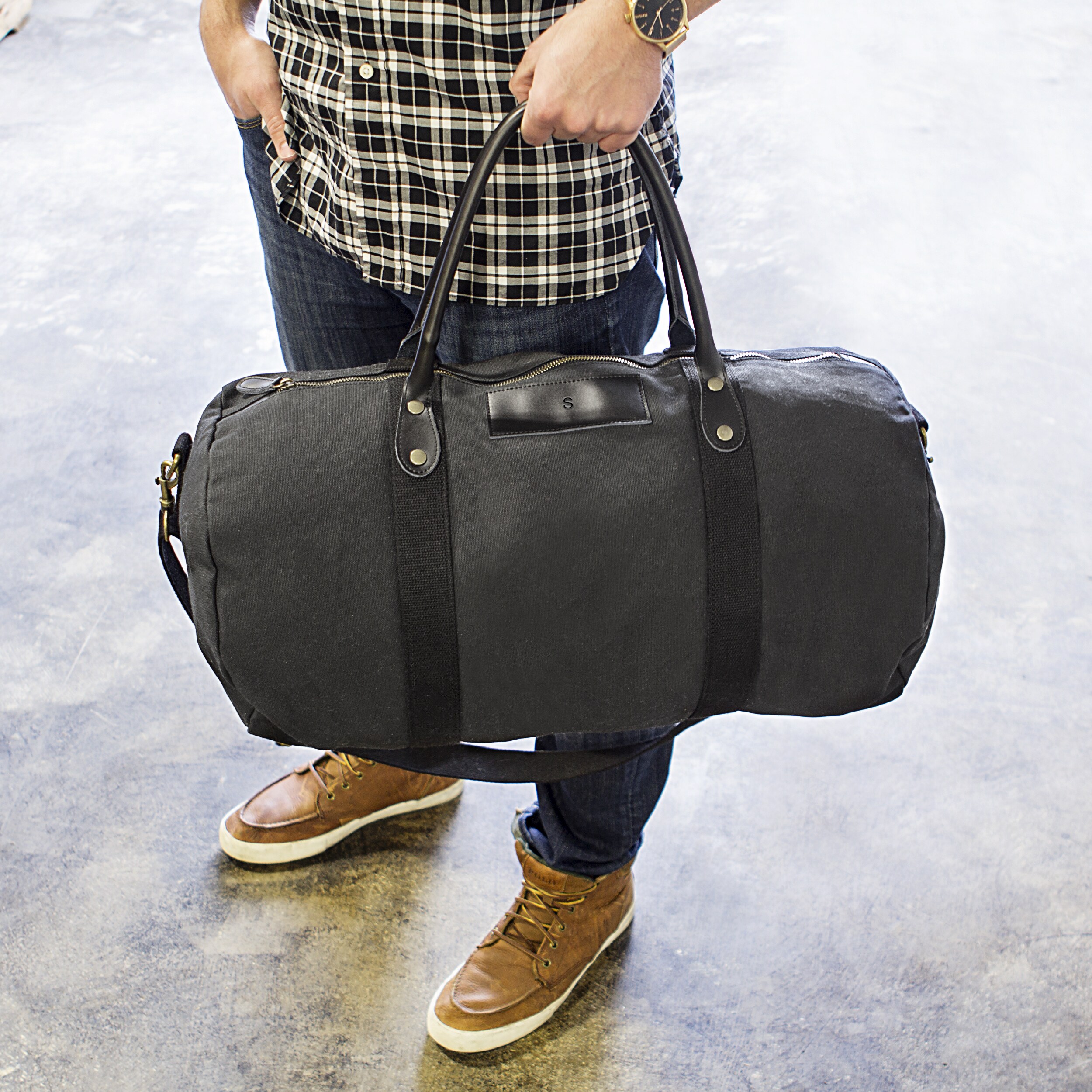 black canvas duffle bag