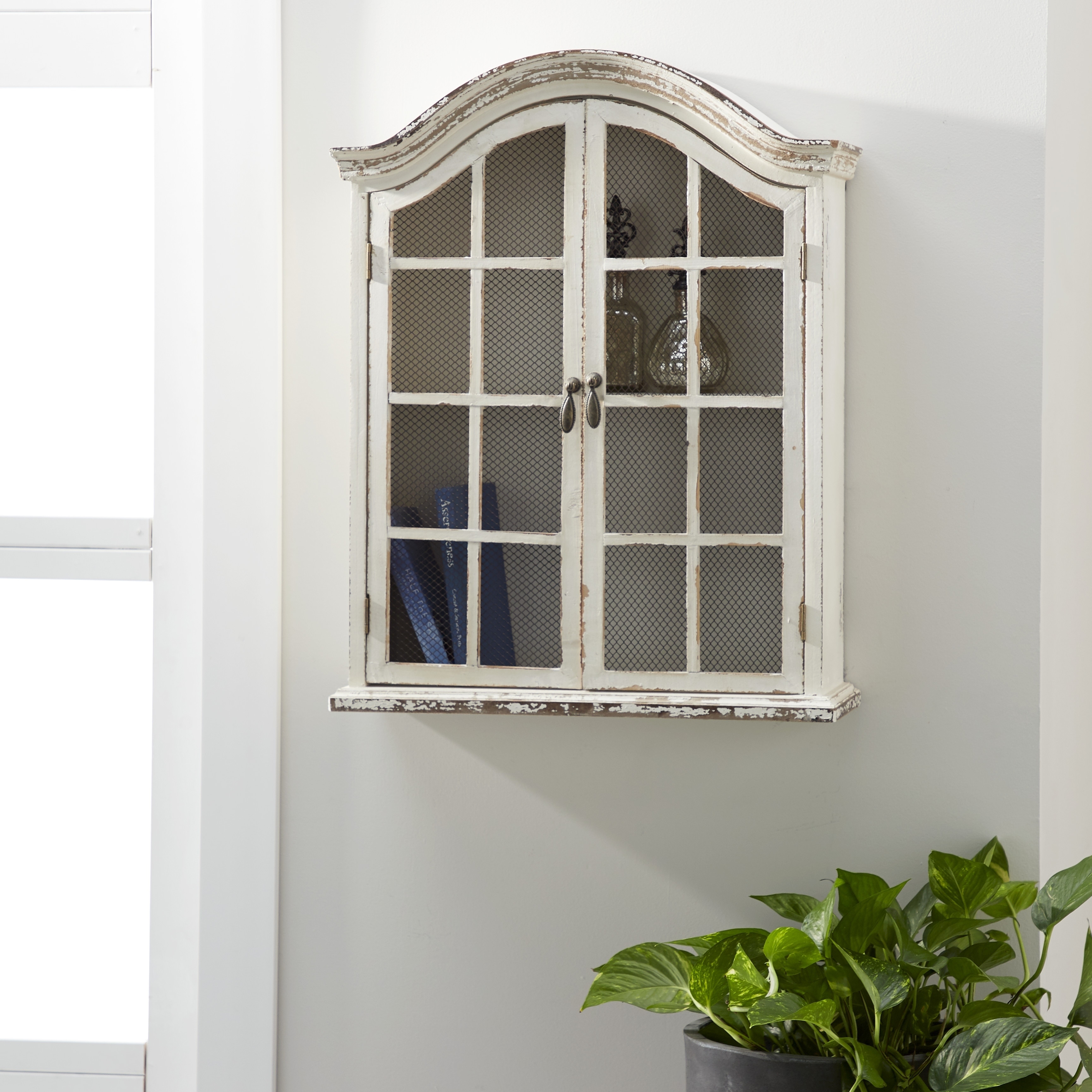 Distressed white wall cabinet