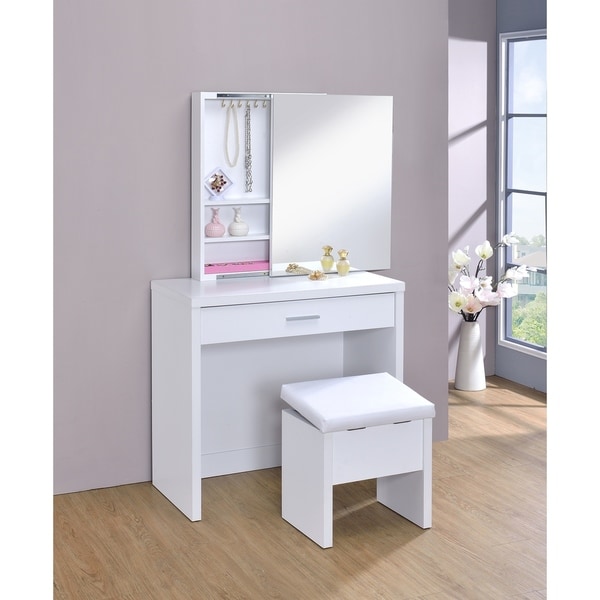 white vanity with mirror and stool